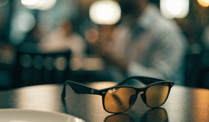 Meta Ray-Ban smart glasses on a cafe table